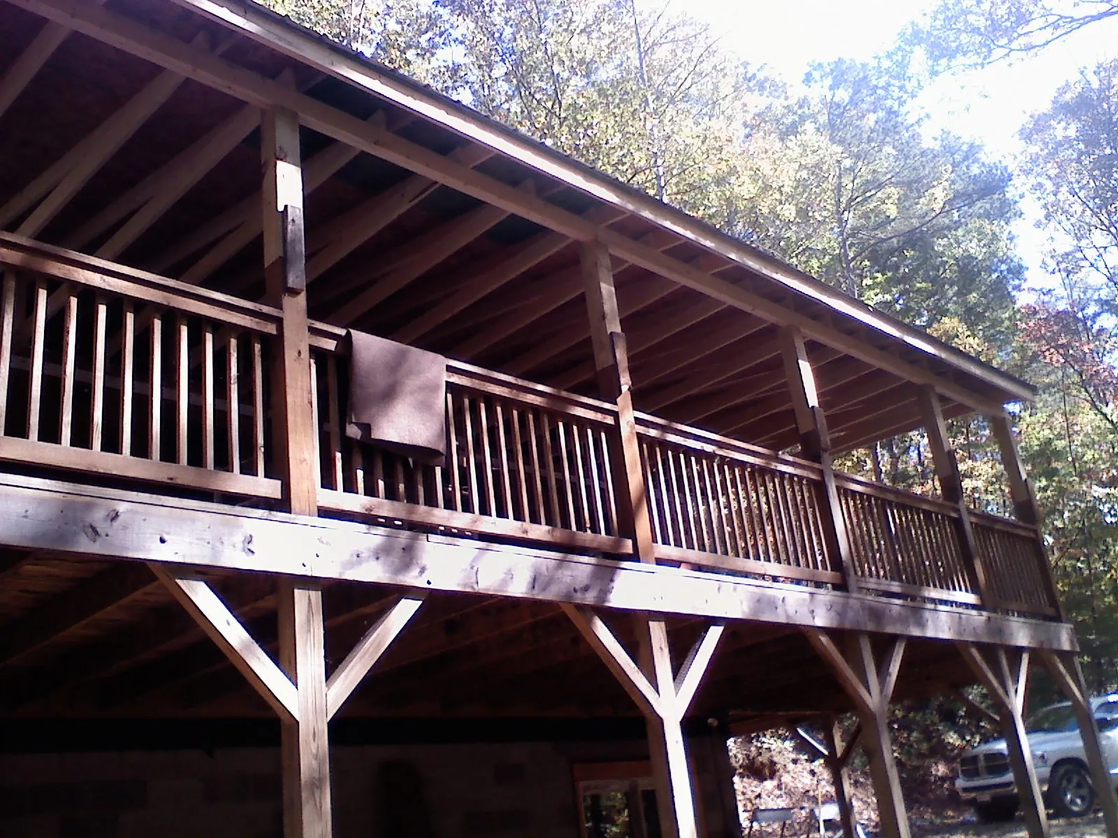 Timber framing under a new elevated porch and deck — Roof Leak Repair in Port Chester by Roofing Brothers